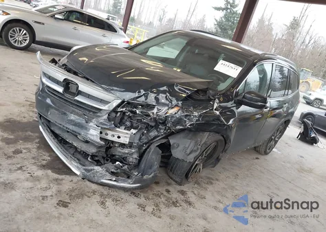 2020 Honda Pilot Awd Touring 7 Passenger z USA, uszkodzony, nr VIN 5FNYF6H69LB007063